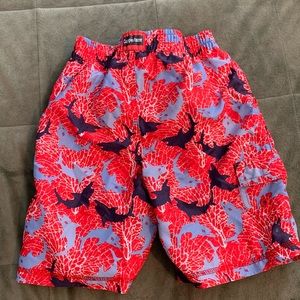 Coppertone boys’ shark red and blue swim trunks with mesh lining, size 3T